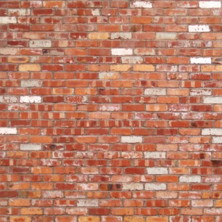 Mur de briques ocre et blanc