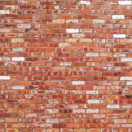 Mur de briques ocre et blanc