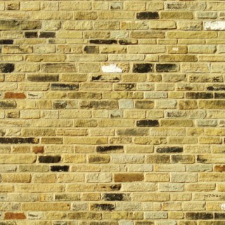 Ancien mur de briques jaunes
