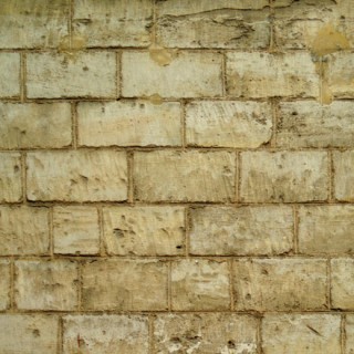 Mur de pierres calcaires jaune