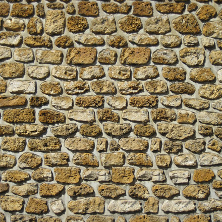 Mur maison en pierre meulière